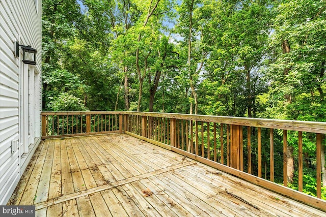 163 Hyde Park Ln, Charles Town, WV 25414 - wooden deck with view of wooded area