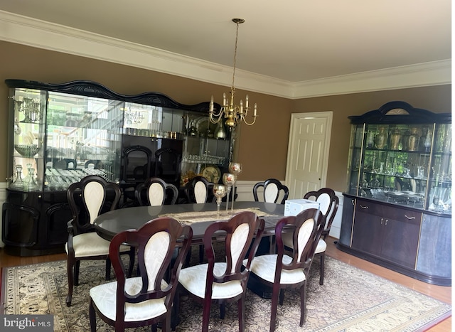 25 Forrest Hills Dr, Voorhees, NJ 08043 - dining room with ornamental molding, a chandelier, and wood finished floors