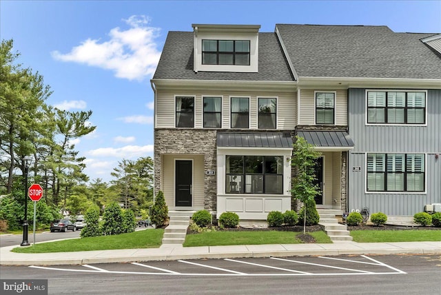 368 Star Tavern Ln, West Chester, PA 19382 - view of property featuring uncovered parking, stone siding, roof with shingles, a standing seam roof, and metal roof