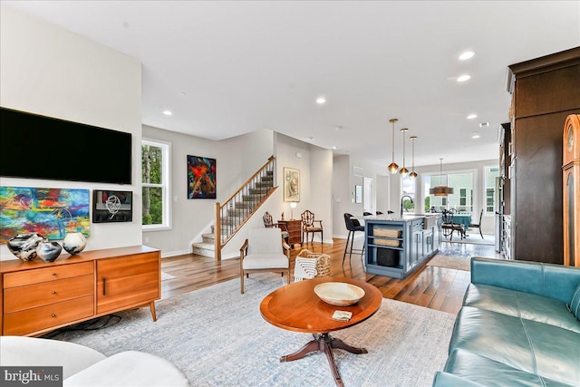 368 Star Tavern Ln, West Chester, PA 19382 - living area featuring light wood-style flooring, stairway, recessed lighting, and baseboards