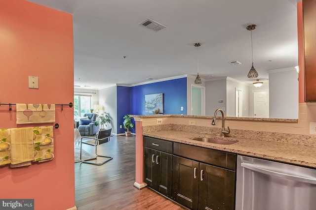 20408 Shore Harbour Dr Unit 5-H, Germantown, MD 20874 - kitchen with stainless steel dishwasher, a sink, open floor plan, wood finished floors, and light stone counters