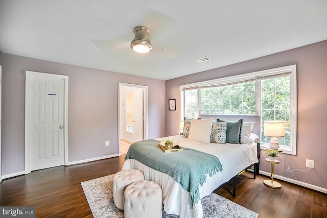 20408 Shore Harbour Dr Unit 5-H, Germantown, MD 20874 - bedroom with baseboards, wood finished floors, and connected bathroom