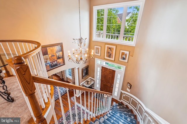 18403 Rim Rock Cir, Leesburg, VA 20176 - stairs with a chandelier and a towering ceiling