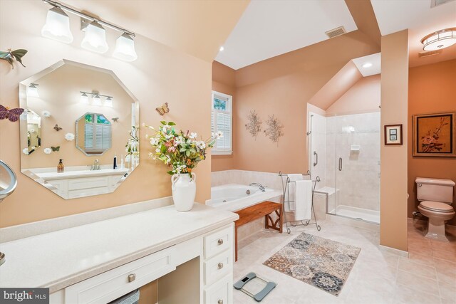 18403 Rim Rock Cir, Leesburg, VA 20176 - bathroom with a jetted tub, a stall shower, toilet, vanity, and tile patterned floors