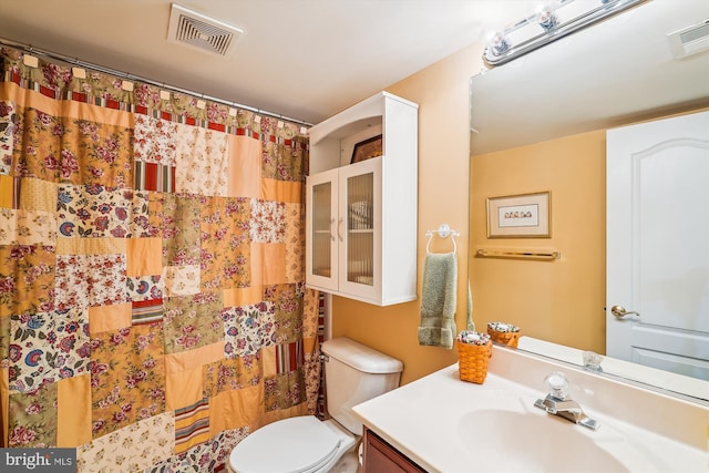 18403 Rim Rock Cir, Leesburg, VA 20176 - bathroom with vanity, toilet, and curtained shower