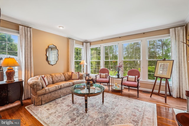 18403 Rim Rock Cir, Leesburg, VA 20176 - living area with crown molding, healthy amount of natural light, and wood finished floors