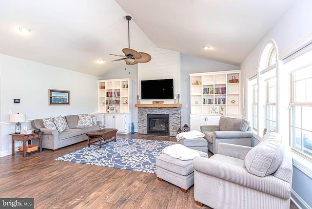 24440 Harvest Cir, Milton, DE 19968 - living room featuring ceiling fan, wood finished floors, plenty of natural light, a fireplace, and high vaulted ceiling