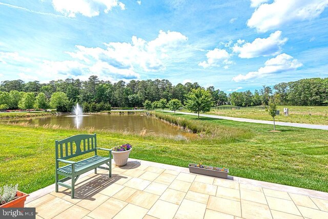 24440 Harvest Cir, Milton, DE 19968 - view of patio with a water view