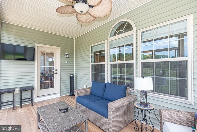 24440 Harvest Cir, Milton, DE 19968 - sunroom / solarium featuring ceiling fan, an outdoor living space, and healthy amount of natural light