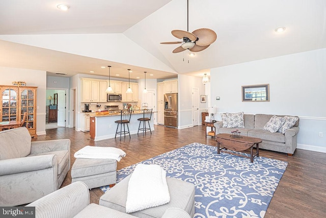 24440 Harvest Cir, Milton, DE 19968 - living area featuring a ceiling fan, dark wood finished floors, baseboards, and high vaulted ceiling
