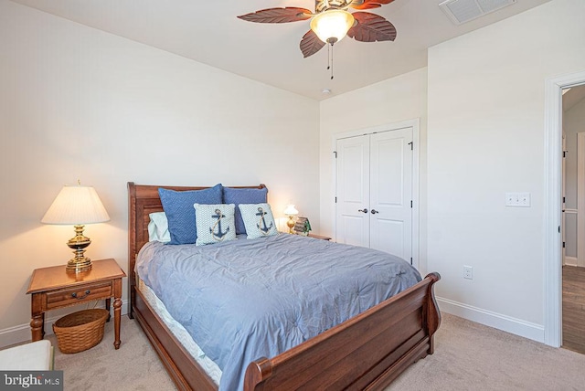 24440 Harvest Cir, Milton, DE 19968 - bedroom with baseboards, carpet floors, a closet, and ceiling fan