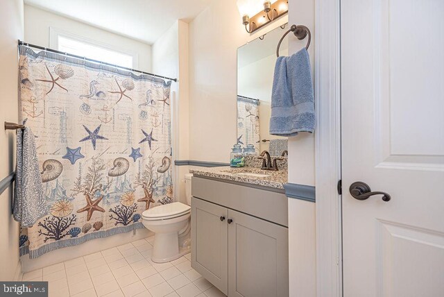 24440 Harvest Cir, Milton, DE 19968 - full bath featuring toilet, tile patterned flooring, vanity, and a shower with curtain