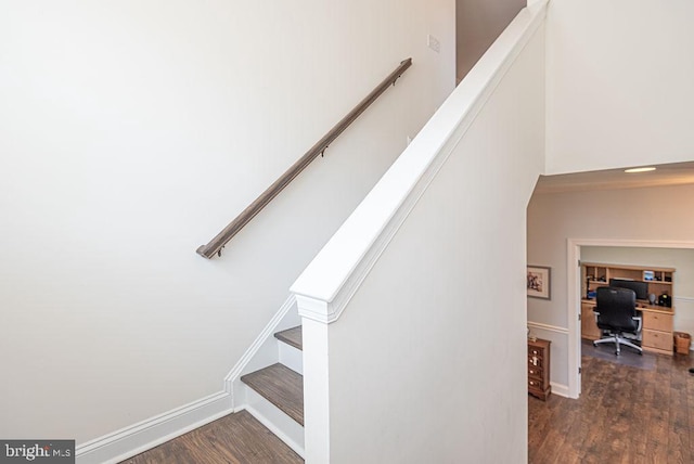 24440 Harvest Cir, Milton, DE 19968 - stairway featuring wood finished floors and baseboards