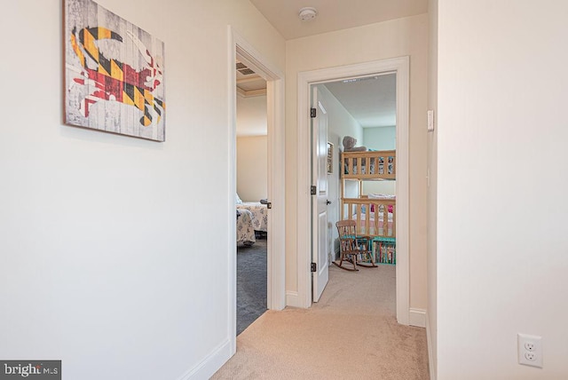 24440 Harvest Cir, Milton, DE 19968 - hall featuring light carpet and baseboards