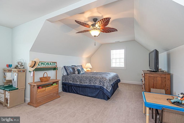 24440 Harvest Cir, Milton, DE 19968 - bedroom with light carpet, vaulted ceiling, ceiling fan, and baseboards