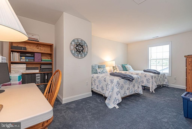 24440 Harvest Cir, Milton, DE 19968 - carpeted bedroom featuring baseboards and a desk