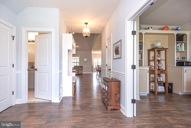 24440 Harvest Cir, Milton, DE 19968 - entryway with wood finished floors, a chandelier, and baseboards