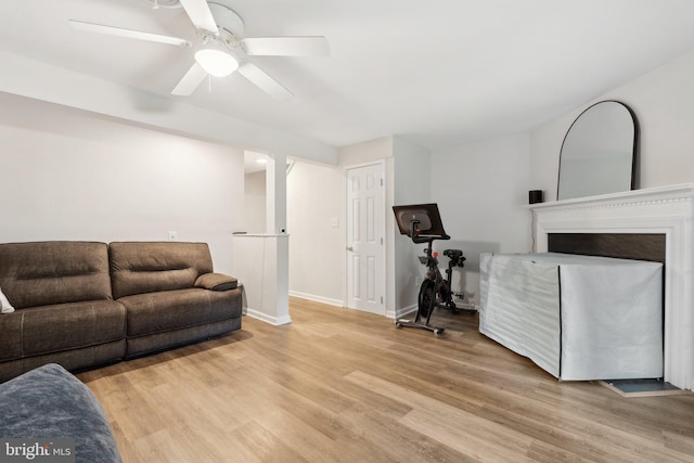 3146 Tipton Way, Abingdon, MD 21009 - living room featuring light wood finished floors, ceiling fan, baseboards, and a fireplace
