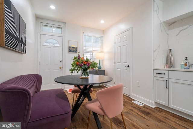 222 S Robinson St, Baltimore, MD 21224 - dining area with dark wood-style flooring, recessed lighting, and baseboards
