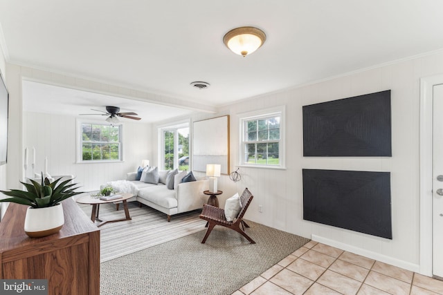 105 Lombardy Dr, Wallingford, PA 19086 - living room with healthy amount of natural light, light tile patterned flooring, crown molding, and a ceiling fan