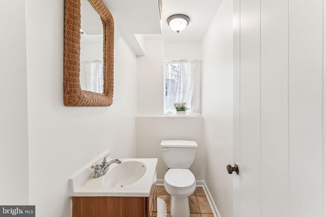 105 Lombardy Dr, Wallingford, PA 19086 - bathroom featuring toilet, vanity, baseboards, and tile patterned floors