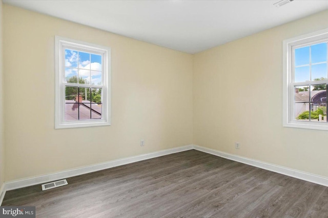 1209 Chapel Oaks Dr, Capitol Heights, MD 20743 - empty room featuring dark wood-style floors and baseboards