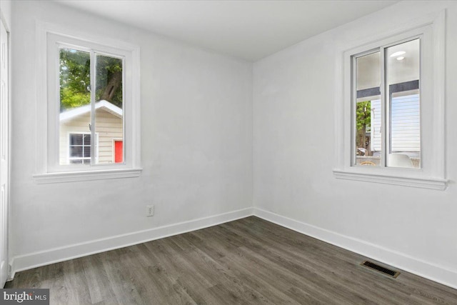 1209 Chapel Oaks Dr, Capitol Heights, MD 20743 - empty room featuring dark wood-type flooring and baseboards