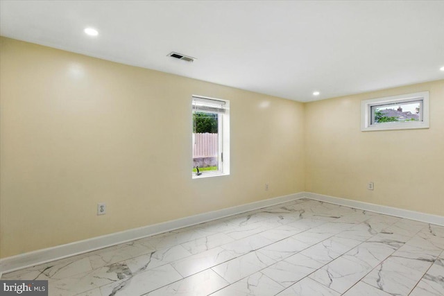 1209 Chapel Oaks Dr, Capitol Heights, MD 20743 - spare room with baseboards, recessed lighting, and light marble finish floors
