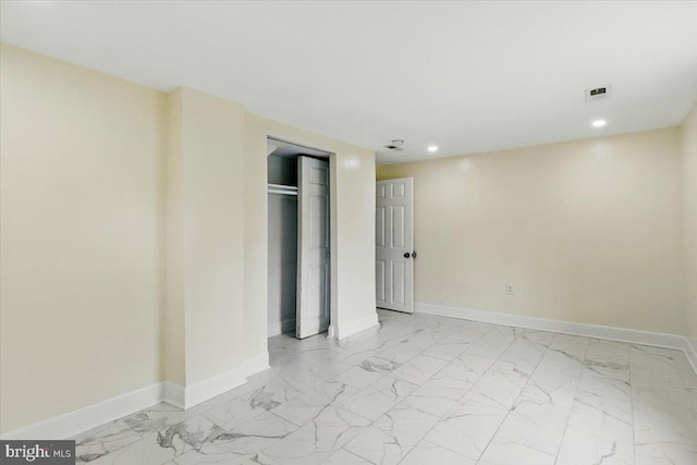 1209 Chapel Oaks Dr, Capitol Heights, MD 20743 - unfurnished room featuring light marble finish flooring, recessed lighting, and baseboards