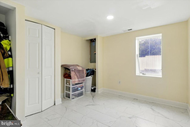 1209 Chapel Oaks Dr, Capitol Heights, MD 20743 - unfurnished bedroom with baseboards, recessed lighting, marble finish flooring, and electric panel