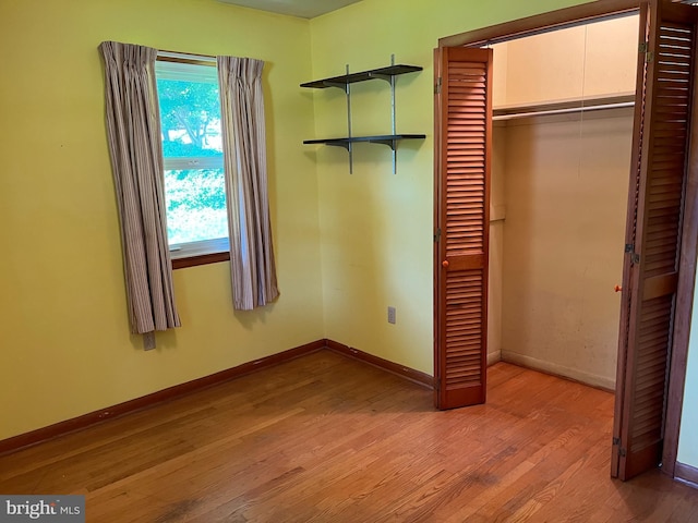 18 Bittersweet Dr, Hagerstown, MD 21740 - unfurnished bedroom with light wood-style floors, a closet, and baseboards