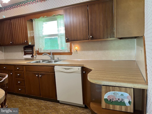 18 Bittersweet Dr, Hagerstown, MD 21740 - kitchen with white dishwasher, a sink, and light countertops