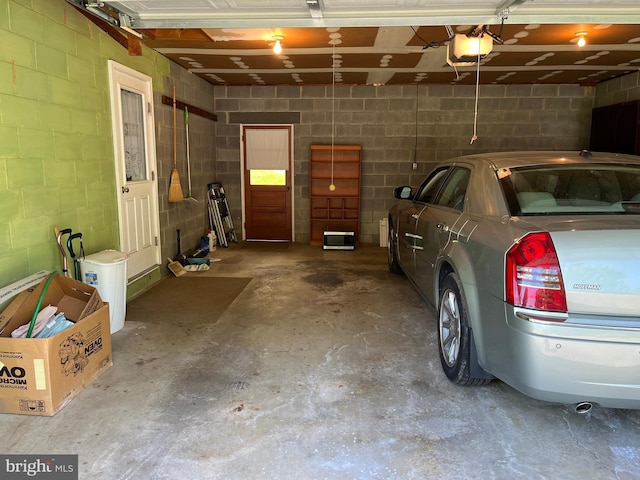 18 Bittersweet Dr, Hagerstown, MD 21740 - garage with concrete block wall and a garage door opener