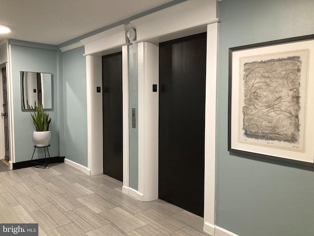 3900 Tunlaw Rd NW Unit 419, Washington, DC 20007 - hall featuring elevator and baseboards