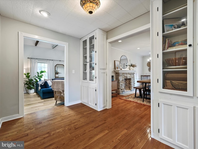 1549 N Jefferson Ct, Lancaster, PA 17602 - entryway with a stone fireplace and dark wood finished floors