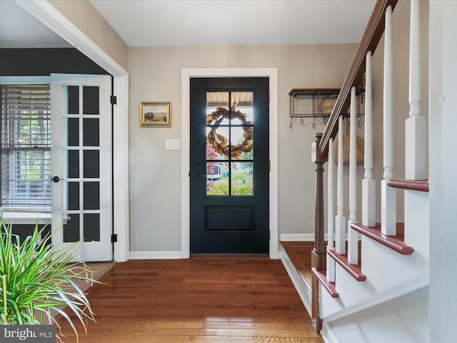 1549 N Jefferson Ct, Lancaster, PA 17602 - foyer featuring wood finished floors, stairway, and baseboards