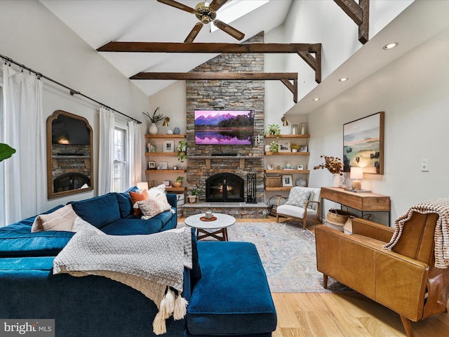1549 N Jefferson Ct, Lancaster, PA 17602 - living area with wood finished floors, high vaulted ceiling, ceiling fan, a fireplace, and beamed ceiling