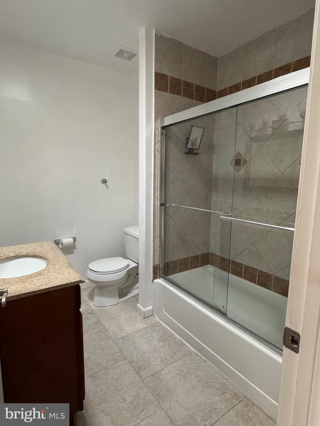 1406 Clarkson St, Baltimore, MD 21230 - bathroom with vanity, combined bath / shower with glass door, and tile patterned floors