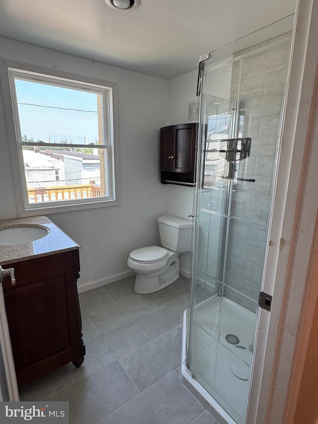 1406 Clarkson St, Baltimore, MD 21230 - bathroom featuring vanity, a stall shower, and tile patterned flooring