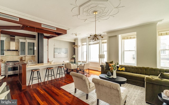 1830 Rittenhouse Sq Unit 11C, Philadelphia, PA 19103 - living room with crown molding, dark wood-type flooring, and a chandelier