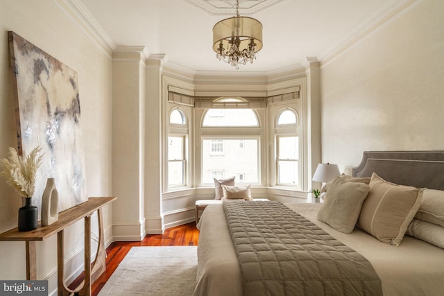 1830 Rittenhouse Sq Unit 11C, Philadelphia, PA 19103 - bedroom featuring crown molding, a chandelier, wood finished floors, and baseboards