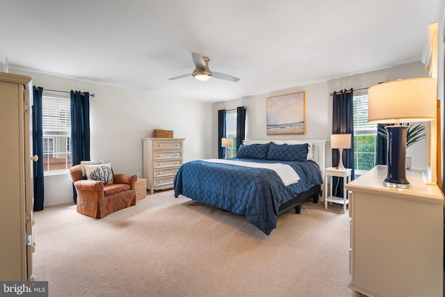 129 Bridle Path Dr, Egg Harbor Township, NJ 08234 - bedroom featuring light carpet, multiple windows, and a ceiling fan