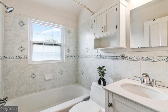 2108 26th St S, Arlington, VA 22206 - bathroom with bathing tub / shower combination, vanity, and tile walls