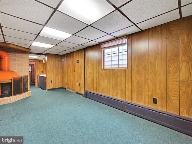 2240 Mahantongo St, Pottsville, PA 17901 - below grade area with a baseboard heating unit, carpet floors, a paneled ceiling, and wooden walls