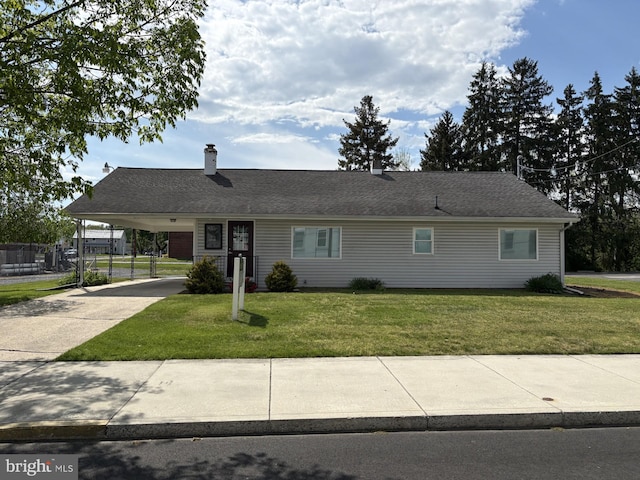 524 S Pitt St, Carlisle, PA 17013 - view of front of property with driveway, a front yard, an attached carport, and a chimney