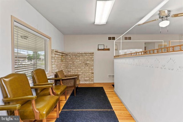 524 S Pitt St, Carlisle, PA 17013 - sitting room with ceiling fan, wood finished floors, and baseboards
