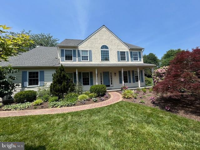 3781 Brookcroft Ln, Garnet Valley, PA 19060 - colonial house featuring a front lawn and covered porch