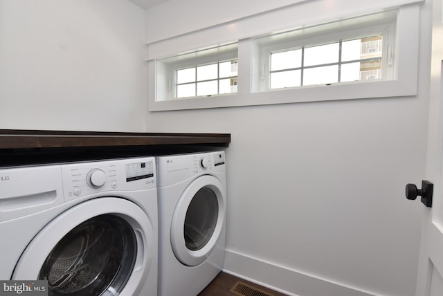 3 Laurel St, Rehoboth Beach, DE 19971 - laundry area featuring washing machine and clothes dryer