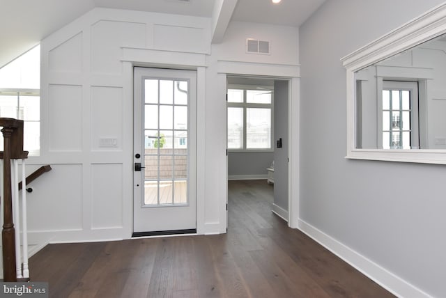 3 Laurel St, Rehoboth Beach, DE 19971 - doorway with dark wood-style flooring, baseboards, and lofted ceiling