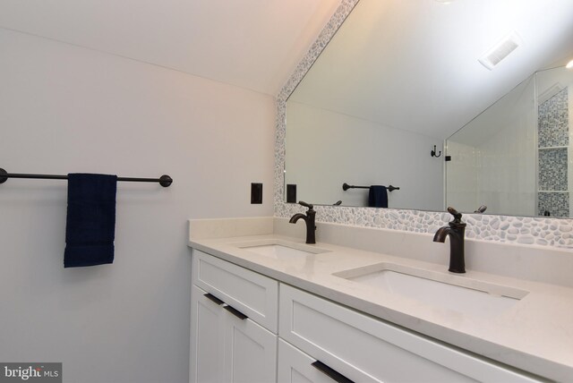 3 Laurel St, Rehoboth Beach, DE 19971 - full bathroom featuring double vanity and a tile shower